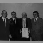 Four executives including Albert J. Tonry, Louis A. Tonry Sr., and Herbert Tonry