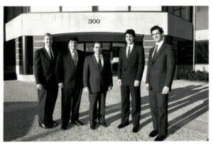 Black and white picture from 1989 of five men who work for Tonry